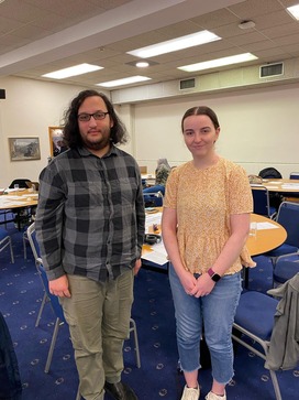 Two young attendees at the forum