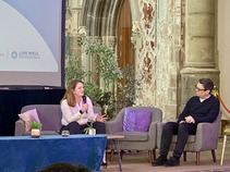 Alison McGovern and Andy Burnham talking on stage