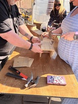 People participating in Men in Sheds bird box making breakout session