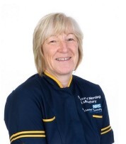 headshot of female in nurses uniform, blonde hair smiling