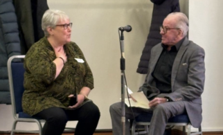 Clinical project manager Sue Mason speaks to a service user 