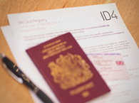 ID4 form with passport, driving licence and pen.