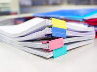 Pile of colour-coded files