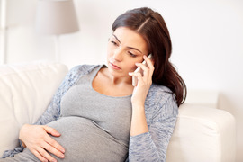 Pregnant lady on phone