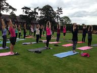 A yoga session in Bushey Rose Garden for the We Move She Moves programme