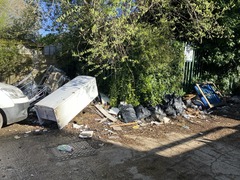 Waste in a service road to be cleared