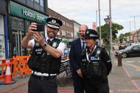 Police and the Police and Crime Commissioner taking a photo together