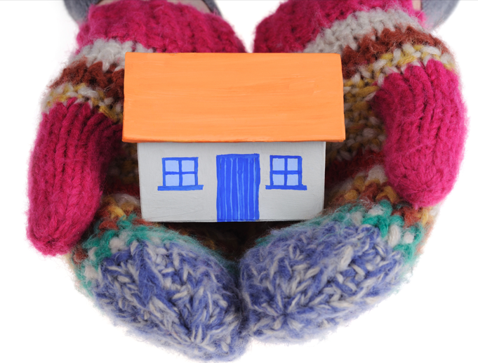 House cupped in mittens