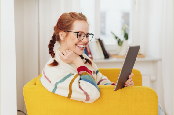 A lady looking at her tablet