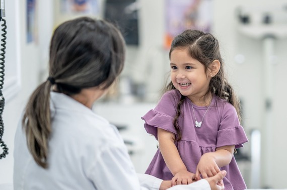 a child talking to a doctor