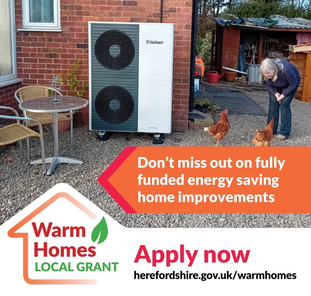 an air source heat pump on the side of a house