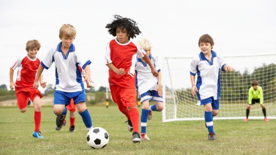 kids playing in a football match