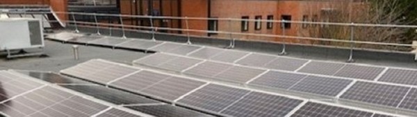Image of solar panels on the roof of a building