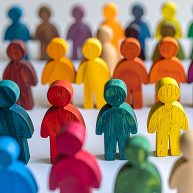 multi coloured figures in a row
