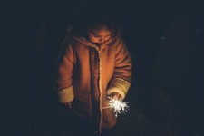 Image of child holding sparkler