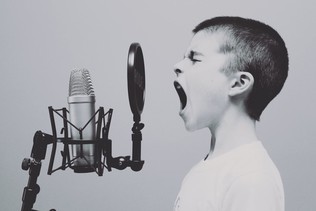 Kid with microphone image