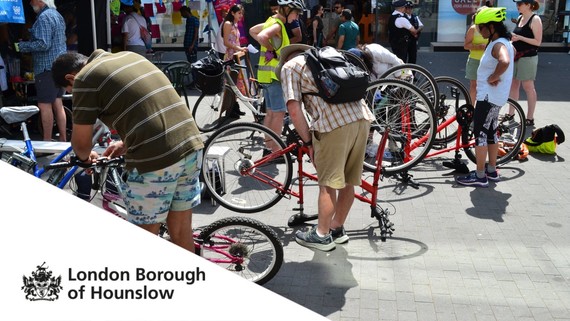 People repairing bikes