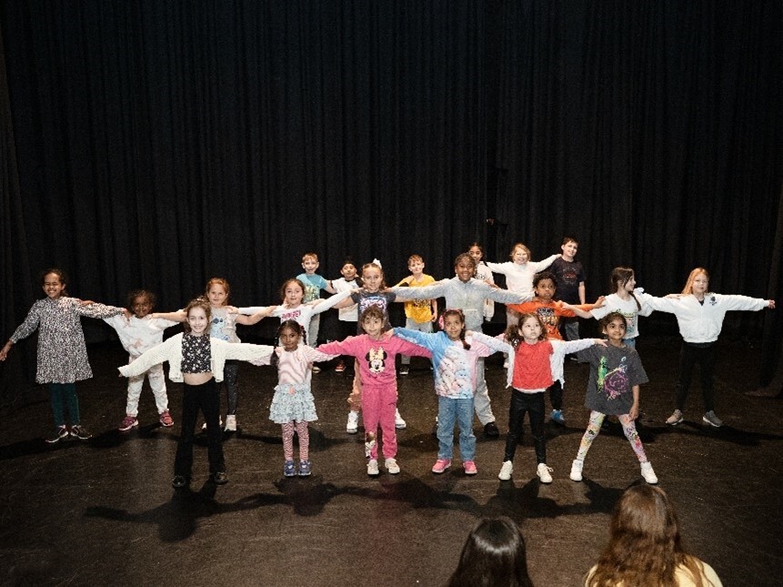 Children enjoying activities as part of the holiday, activities, and food offer