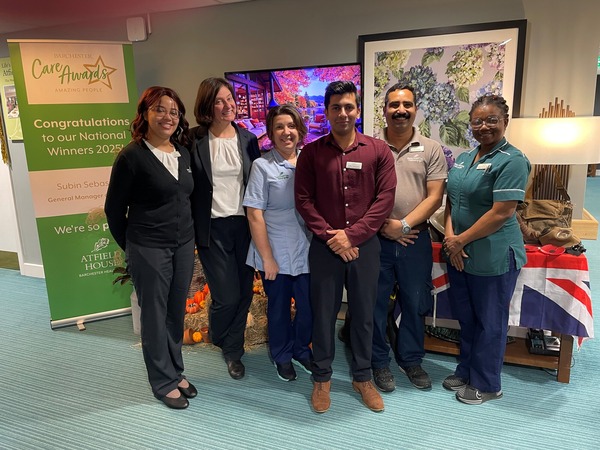 Subin (third from right) and colleagues at Atfield House (L-R) – Dara, Krisztina, Nadia, Suresh, and Linda