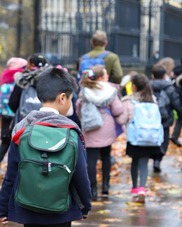 Image depicting children walking to school
