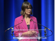 photo of Susan Hopkins giving opening address 
