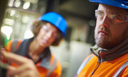 Gas safety workers wearing protective uniform 