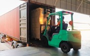 Fork lift truck unloading lorry