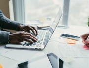 Delegate accessing online course on a laptop