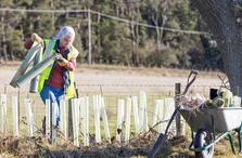 community volunteer working in a field