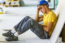 stressed construction worker