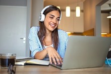 female worker on laptop at home