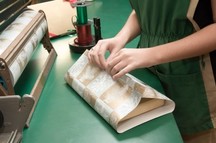 gift being wrapped in retail store