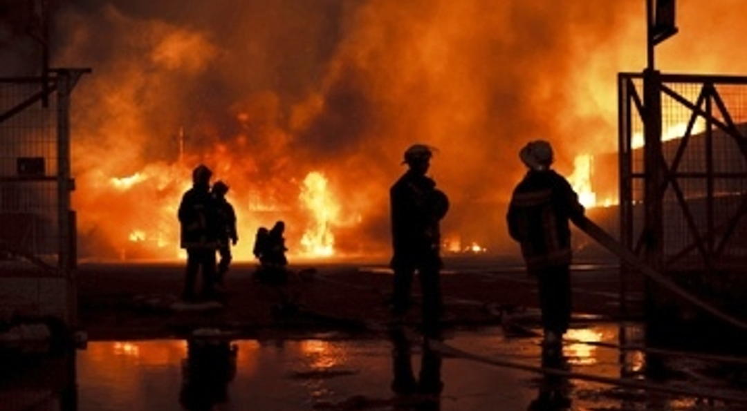 People stood near fire