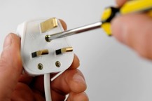 unscrewing a plug