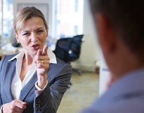female worker shouting at colleague