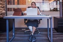 disabled worker sat at desk