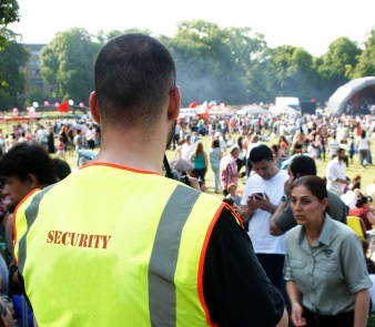 security guard overseeing a festival