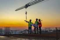 Construction workers on roof, at height