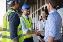 Two inspectors being welcomed onto site