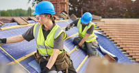 construction workers on a roof