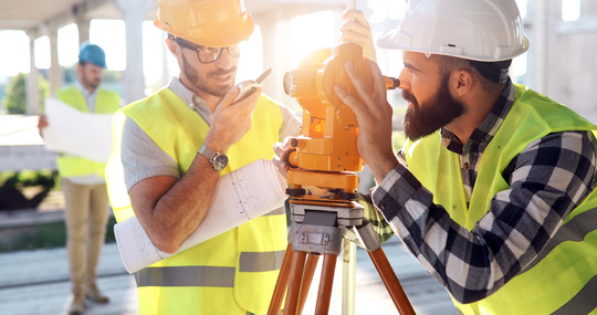 Surveyor on construction site