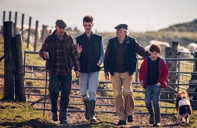 farmers and a child walking on a farm