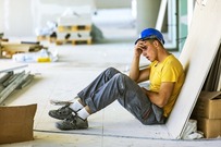 stressed construction worker on site