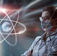 Stock image of a woman with computer generated image of an atom