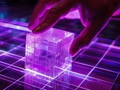 Hand holding lit up cube