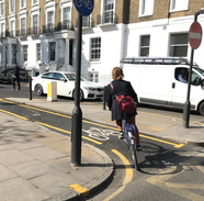 person riding bike crop