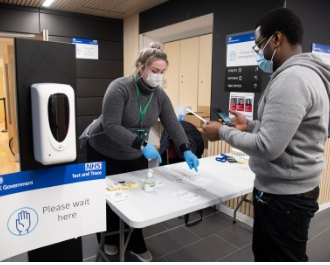 Staff and key worker at testing site