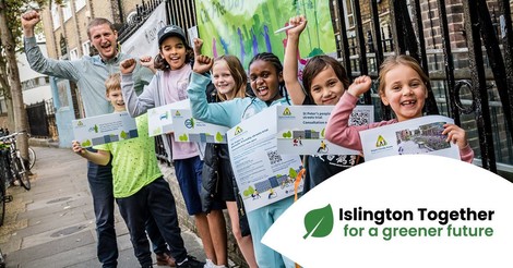Group of children cheering at a Together Greener event in Islington.