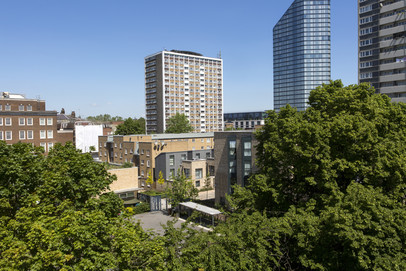 Pankhurst Terrace external view through trees on a sunny day in Islington