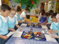 Pupils cooking in school